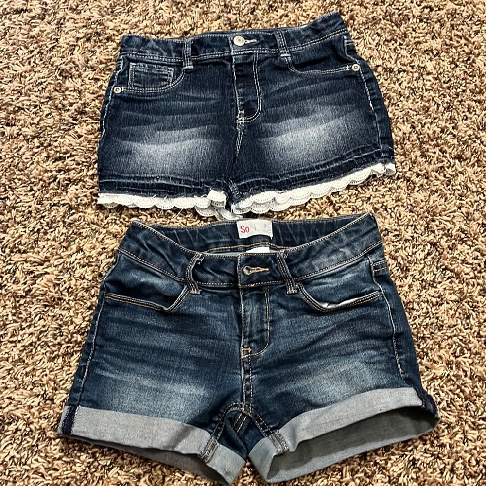 Girls Jean shorts size 8. Stretchy! Both have adjustable waist bands too!